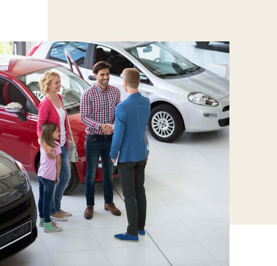 A car salesman talking to a family